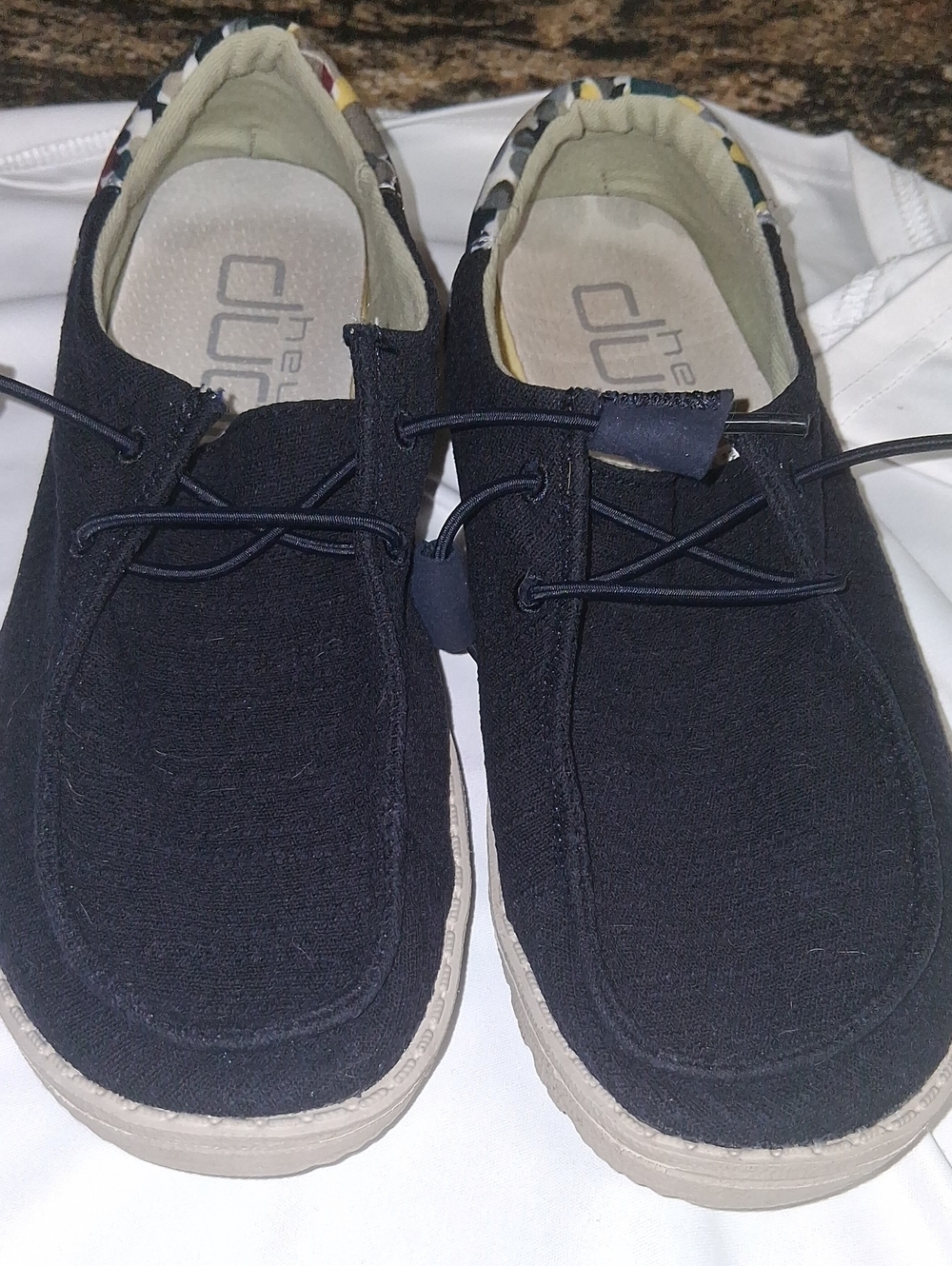 Hey Dude  Slip-On Canvas Shoes - Navy In Color With Multi Color Back. Firm Price